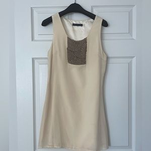 Silk-lined, chiffon mini-dress with gold metalwork detail